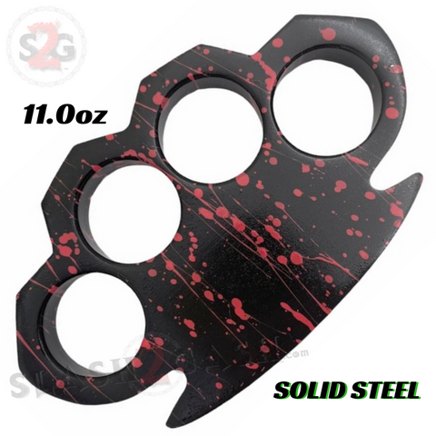 Solid Black Steel Brass Knuckle Duster Belt Buckle Paperweight w/ Pink Blood Splatter